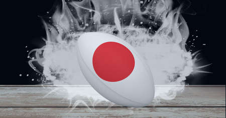 England flag on rugby ball over wooden surface against smoke effect on black background. sports tournament and competition conceptの写真素材