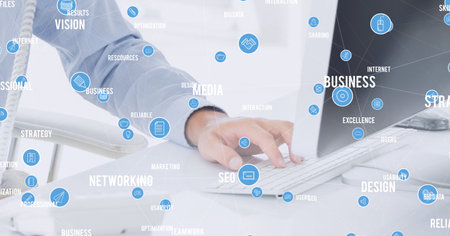 Business concept texts over network of connections against mid section of man using computer. global business and technology conceptの写真素材