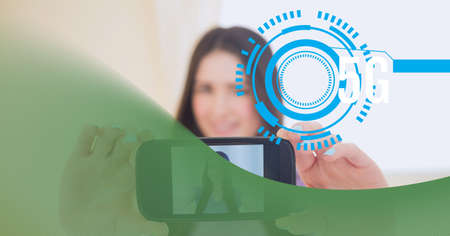 5g text and round scanner over woman taking a selfie from smartphone against technology background....