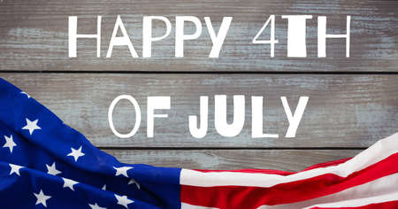 Happy independence day text and american flag against wooden background. american independence template background design conceptの写真素材