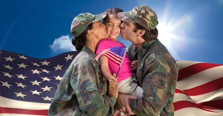 Composition of male and female soldier parents kissing their daughter holding american flag. american patriotism and independence concept digitally generated image.の写真素材