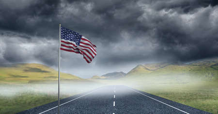 Composition of waving american flag against stormy sky and countryside road. united states patriotism and independence concept digitally generated image.の写真素材
