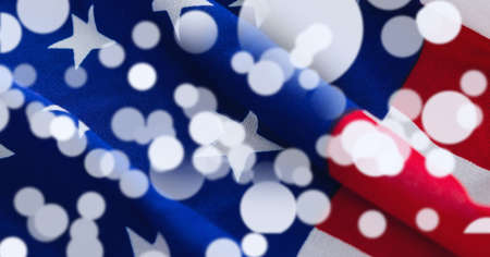 Composition of white circles over american flag. american patriotism, independence and celebration concept digitally generated image.の写真素材