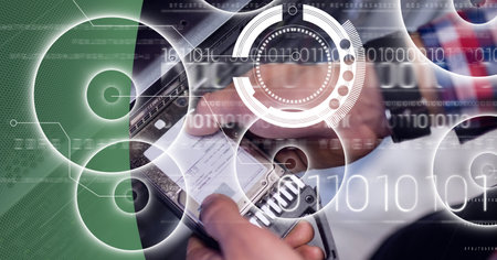 Binary coding data processing over man working in server room against green technology background....