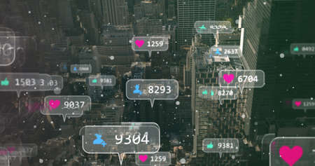 Multiple speech bubbles with social media icons and increasing numbers against cityscape. social media networking and technologyの写真素材