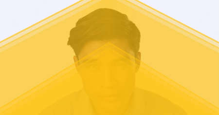 Yellow technology background over portrait of man against white background. business and modern...