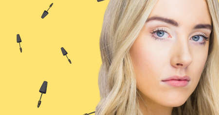 Composition of mascara with woman repeated on yellow background. fashion and accessories background...