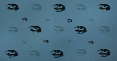 Composition of lips repeated on blue background. fashion and accessories background pattern concept...