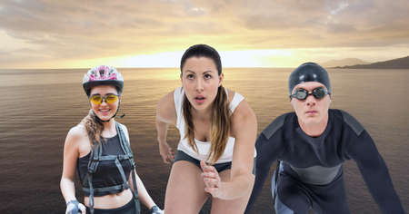 Composition of male swimmer, female climber and woman running, over sunset and sea. sport and competition digitally generated image.の写真素材