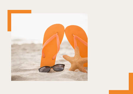 Photograph of flip flops, sunglasses and starfish at the beach against grey background. summer holiday and vacation conceptの写真素材