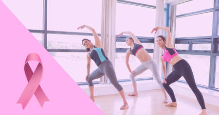 Composition of pink ribbon icon and breast cancer text, with diverse group of women practicing yoga. breast cancer positive awareness campaign concept digitally generated image.の写真素材
