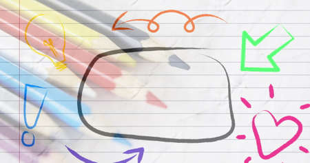 Image of hand drawn speech bubble with icons over colour pencils ruled paper background. education,...