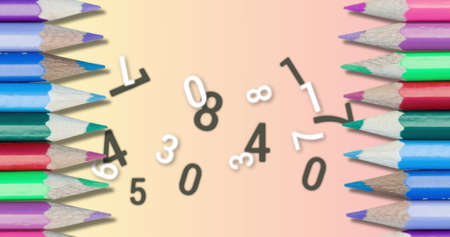 Colored pencils against multiple changing numbers and alphabets on pink background. school and education conceptの写真素材