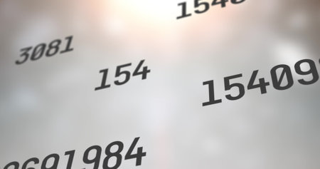 Digital image of multiple changing numbers against spots of light on grey background. school and education conceptの写真素材