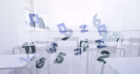 Digital composition of changing numbers and alphabets floating against empty classroom. school and education conceptの写真素材
