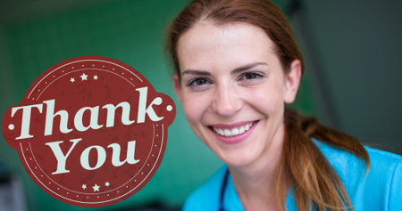 Animation of thank you text over female doctor smiling. positive awareness campaign concept digitally generated video.の写真素材