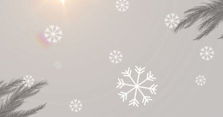 Digital image of snowflakes falling over ho ho ho text and bright spot of light on grey background. christmas festivity celebration tradition conceptの写真素材