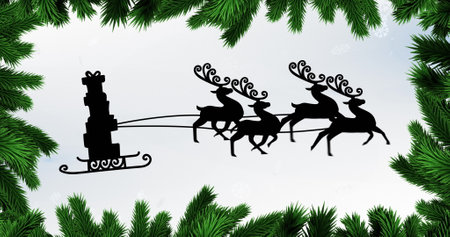 Digital image of leaves forming a frame against black silhouette of christmas gifts in sleigh being pulled by reindeers against white background. christmas festivity celebration tradition conceptの写真素材