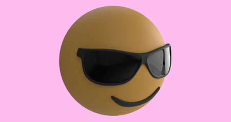 Image of a nodding smiling emoji icon wearing sunglasses on a pink background with falling gold confetti 4kの写真素材
