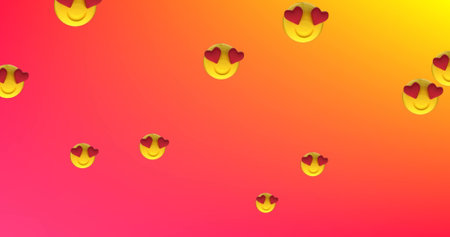 Image of multiple heart eyes face emojis floating against gradient red to orange background. Global social media network concept digitally generated image.の写真素材