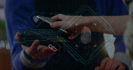 Image of digital interface with fingerprint over two Caucasian people making a payment with...