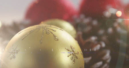 Image of christmas gold, red baubles and pine cones decorations. christmas seasons festivity celebration concept digitally generated image.の写真素材