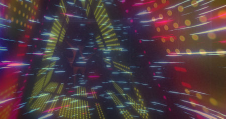 Image of light trails over glowing neon tunnel background. colour, movement and light concept...
