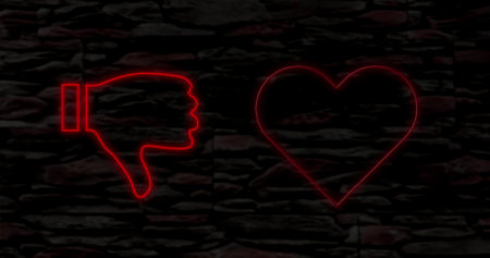 Image of red neon thumbs up thumbs down heart and cloud symbols flashing on black background. valentines day, social media, love and romance concept, digitally generated image.の写真素材