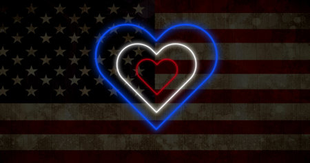 Image of red white and blue concentric neon hearts flashing on american flag background. valentines day, love and romance concept, digitally generated image.の写真素材