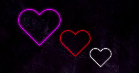 Image of pink red and white neon hearts flashing on black background. valentine's day, love and romance concept, digitally generated image.の写真素材
