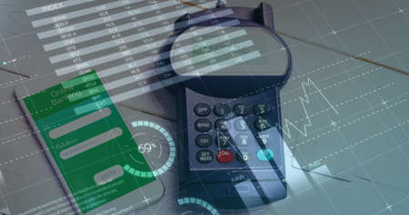 Image of financial data processing over payment terminal and smartphone. global finances, business...