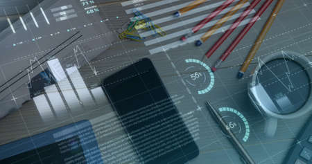 Image of financial data processing over desk with tablet and smartphone. global finance and business concept digitally generated image.の写真素材