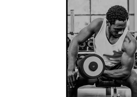 African american fit man working out with dumbbells at gym against copy space on black background. gym, fitness and healthy lifestyle background template illustration conceptの写真素材