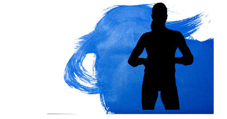 Silhouette of female handball player against blue paint brush strokes on white background. sports and competition conceptの写真素材