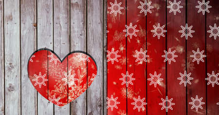 Image of snowflakes over wooden background. christmas, winter, tradition and celebration concept digitally generated image.の写真素材