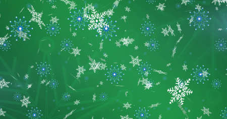 Image of falling snowflakes on green background. christmas, tradition and celebration concept digitally generated image.の写真素材