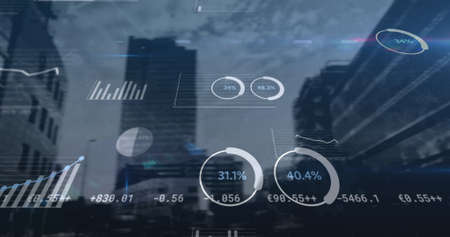 Financial and statistical data processing against tall buildings in background. global finance and business conceptの写真素材