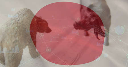 Image of network of connection and numbers changing over bear and bull and flag of japan waving. global finances and business concept digitally generated image.の写真素材