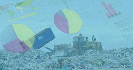 Statistical data against bulldozer working on landfill with birds in the sky. finance and economy conceptの写真素材