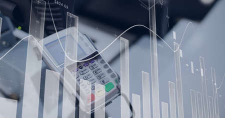 Image of financial data processing over payment terminal. global finances, business and contactless...