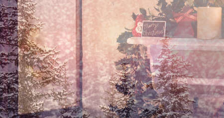 Image of winter landscape and christmas decoration. christmas, tradition and winter celebration concept digital composite image.の写真素材