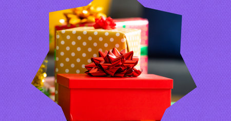 Composition of presents in star shape on purple background at christmas. christmas, winter,...