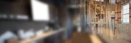 Blurred image of empty corporate office and wooden structures at construction site. incomplete construction site.の写真素材