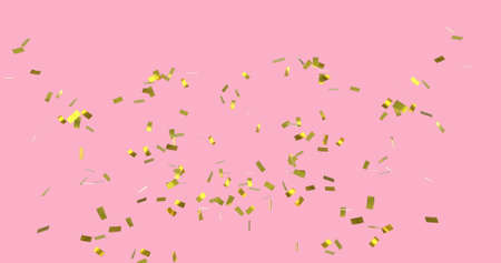 Digital image of gold confetti falling against a pink backgroundの写真素材