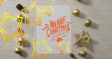 Image of merry christmas text over baubles. christmas, winter, tradition and celebration concept...