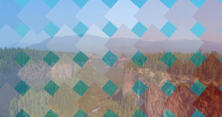 Image of squares in red, white and blue of flag of america, over mountains and forest. patriotism, independence and nature concept digitally generated image.の写真素材