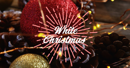 Image of white christmas text over christmas decorations. christmas, winter, tradition and celebration concept digitally generated image.の写真素材
