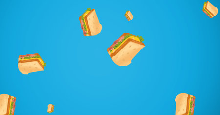 Digital composite image of falling cheese sandwiches against blue background. multiple image, fast food and creativity.の写真素材