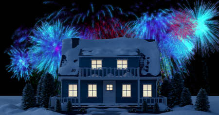 Image of colourful christmas and new year fireworks exploding in night sky over house in snow. christmas, new year, celebration, party and tradition concept digitally generated image.の写真素材