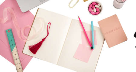 Image of make it your spot text on memo note over laptop and office items on white background. national clean your desk day concept digitally generated image.の写真素材